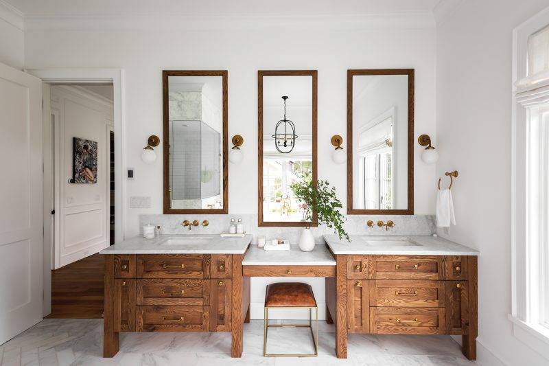 Interior of a sleek modern bathroom with double vanity.