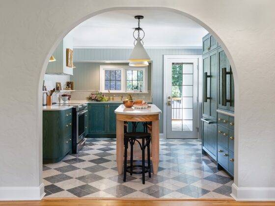 Transformation of a 1940s-era kitchen into a timeless, functional space with bold, English-inspired design
