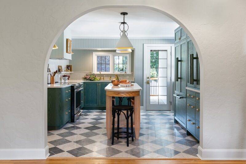 Transformation of a 1940s-era kitchen into a timeless, functional space with bold, English-inspired design